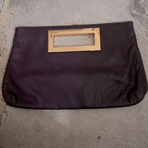 Michael Kors purple and gold clutch great condition leather